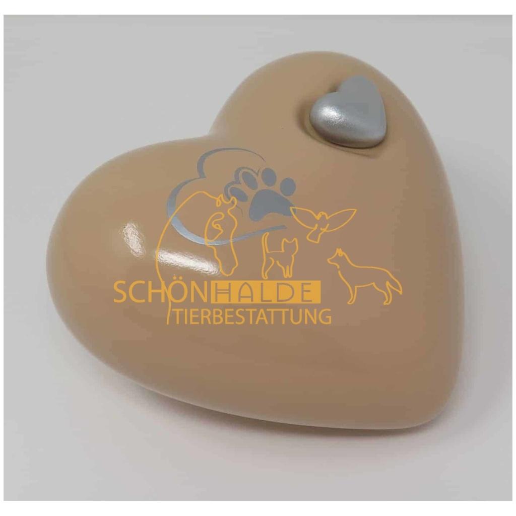 Herzurne Pfoetchenschleife in Hautfarben